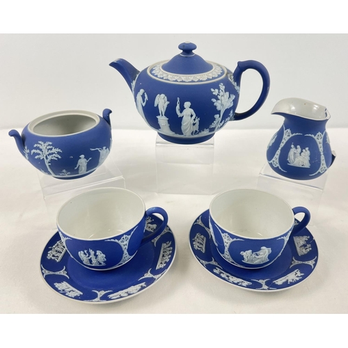 1184 - A 19th century Wedgwood Portland blue Jasperware dipped tea for two set. Comprising: lidded teapot, ... 