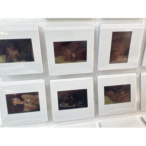 15 - A collection of 65 assorted adult erotic glamour model professional photographic transparencies. No ... 