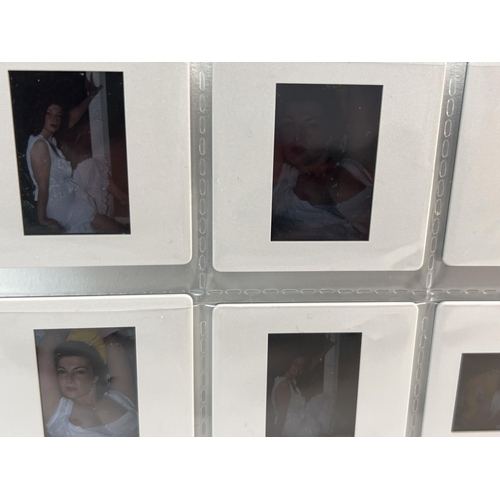 15 - A collection of 65 assorted adult erotic glamour model professional photographic transparencies. No ... 