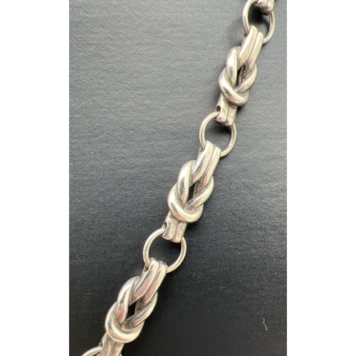 1018 - A Granny knot link silver necklace by Argento with lobster style clasp. 16 inches long with 2 inch e... 