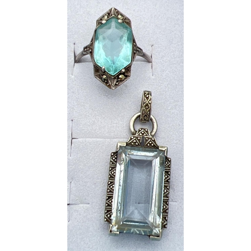 1046 - 2 vintage silver Art Deco jewellery items. A dress ring set with a blue stone & marcasite's and a re... 