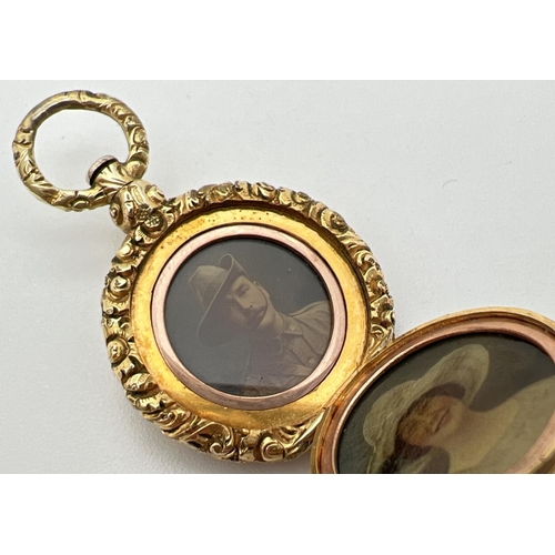 1047 - An Edwardian gold locket with floral design and engine turned detail. Central flower detail to front... 