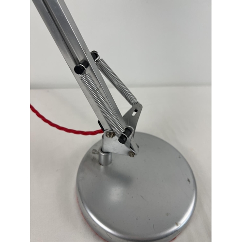 1385 - A vintage chrome metal angle poise lamp with angled head. Replacement baize to base. Fully extended ... 