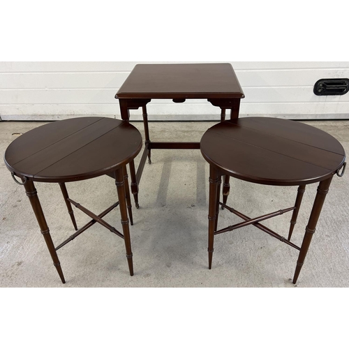 1394 - A vintage dark wood nest of 3 tables with 2 small drop leaf folding tables and larger square shaped ... 