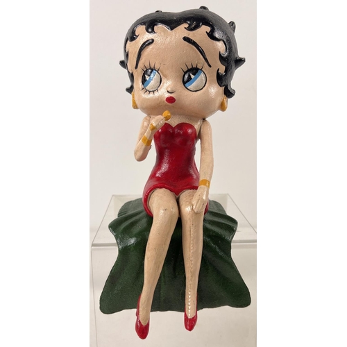 1160 - A painted cast iron shelf figure of Betty Boop singing. Approx. 26cm long and weighs 2.75kg.