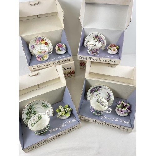 1193 - A full set of 12 boxed Royal Albert 'Flower of the Month' cup & saucer sets each with a flower displ... 