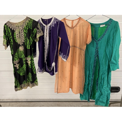 1334 - 4 ethnic style tunics in varying sizes. To include black and green patterned cotton with embroidery ... 