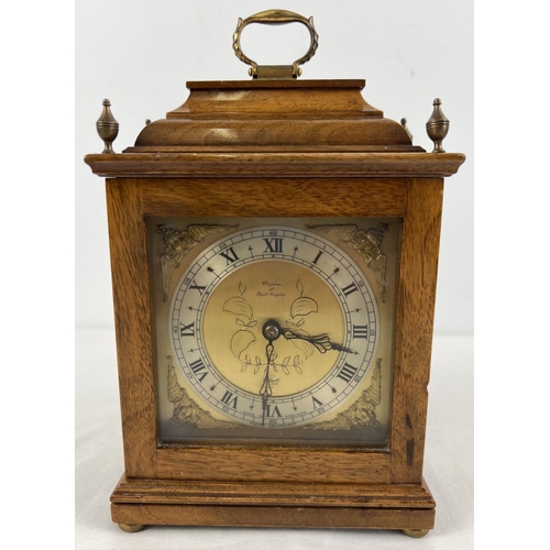 1182 - A vintage wooden cased Elliott mantel clock with French escapement. From Croydons Jewellers of East ... 