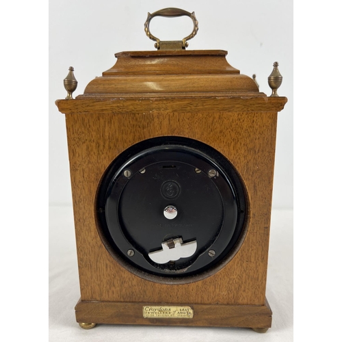 1182 - A vintage wooden cased Elliott mantel clock with French escapement. From Croydons Jewellers of East ... 