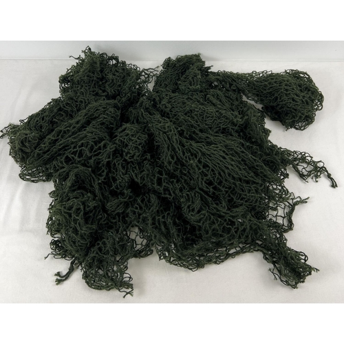 1179 - A quantity of 26 green military helmet nets.