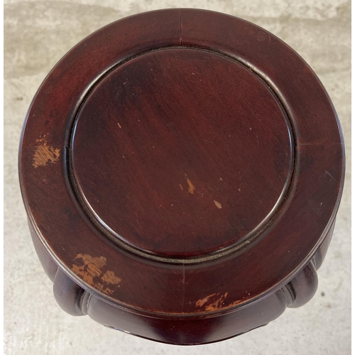 1404 - A vintage Oriental style hardwood jardiniere stand with circular shaped top and cabriole style shape... 