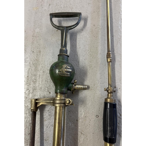 1166 - An antique brass Eclipse No. 1 garden sprayer with name plate and wooden handle. Together with a buc... 