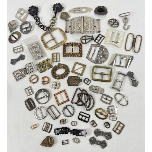 1341 - A collection of approx 60 vintage metal buckles and dress clips in varying sizes and designs. To inc... 