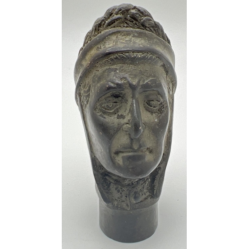 1172 - A vintage hollow bronze walking cane handle modelled as a head. Approx. 8.5cm long.