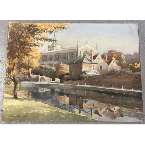 1364 - An unframed vintage watercolour on board of a church by a riverside by A. Houghton 1952. Signed to b... 