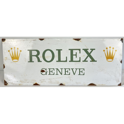 1175 - A rectangular shaped enamelled metal wall advertising sign for Rolex. Approx. 23cm x 58cm.