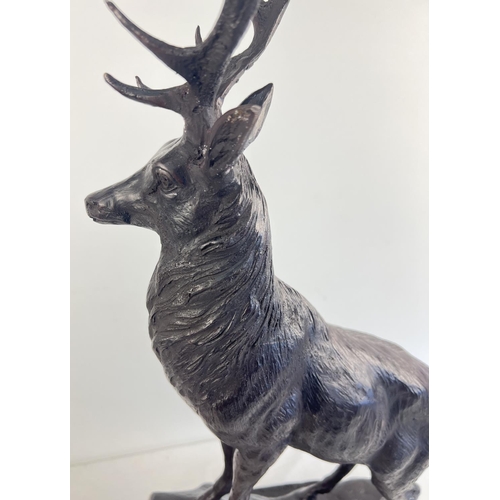 1176 - A very large bronze figure of a stag mounted on a black marble base. Approx. 71cm tall x 35cm wide a... 