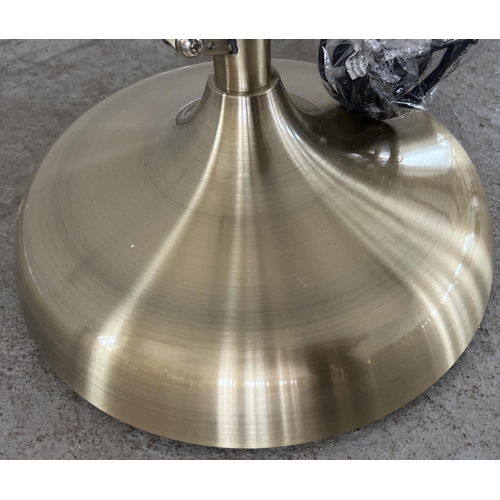 1387 - A new and unused brushed gold metal floor standing anglepoise standard lamp. Complete with original ... 