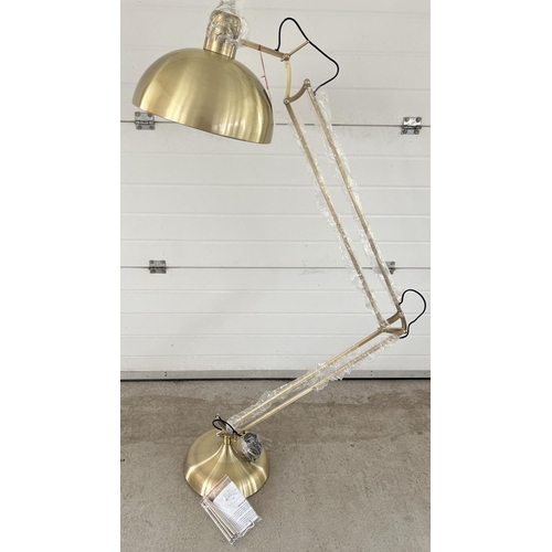 1387 - A new and unused brushed gold metal floor standing anglepoise standard lamp. Complete with original ... 