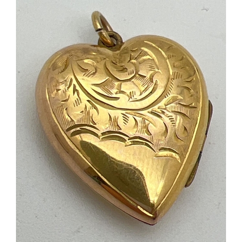 1091 - A vintage 9ct gold front and back heart shaped locket with half floral engraved decoration to front.... 