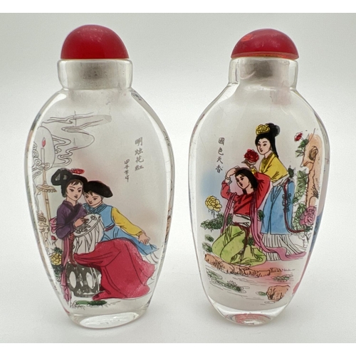 1278 - 2 Oriental interior painted glass snuff/scent bottles with figural detail to both sides. Each approx... 