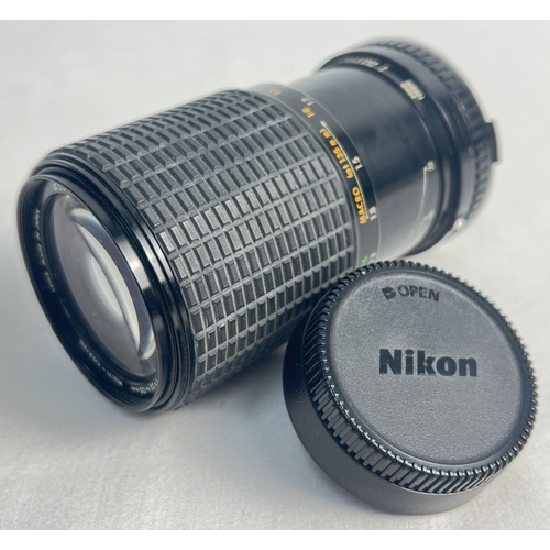 1283 - A Nikon Multi-Coated 35-135 MM Sigma zoom lens.