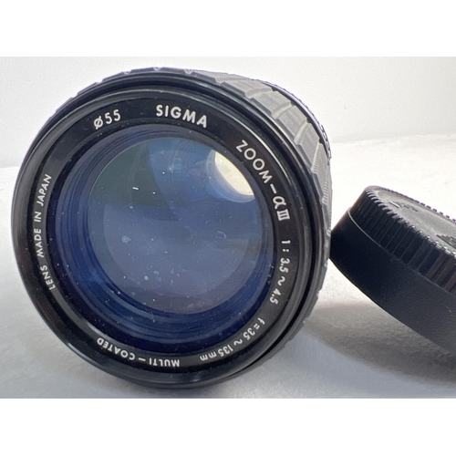 1283 - A Nikon Multi-Coated 35-135 MM Sigma zoom lens.