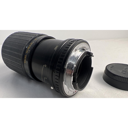 1283 - A Nikon Multi-Coated 35-135 MM Sigma zoom lens.