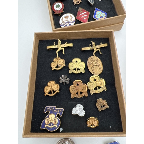 1357 - A collection of vintage Girl Guiding brass and enamel badges. Lots includes group leaders ribbon, 10... 