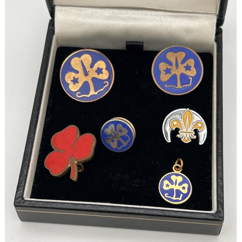 1357 - A collection of vintage Girl Guiding brass and enamel badges. Lots includes group leaders ribbon, 10... 