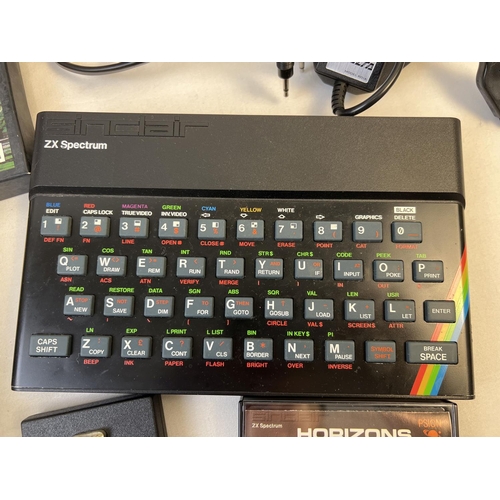 2 - A vintage Sinclair ZX Spectrum 48K personal computer and accessories. Complete with ZX power supply,... 