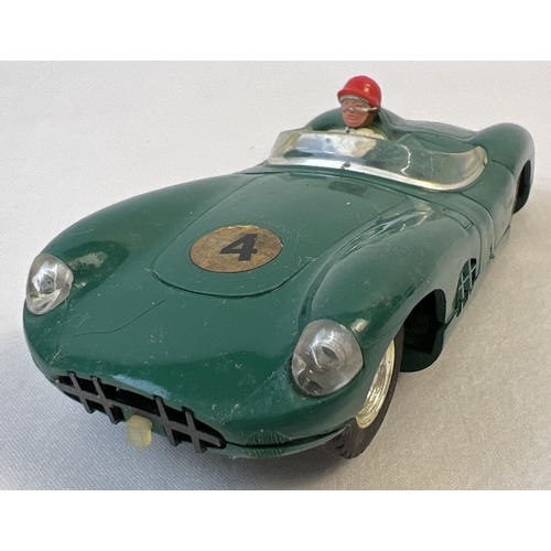 11 - A Boxed 1960's Tri-ang Scalextric green Aston Martin MM/C57 racing car with electric head and tail l... 