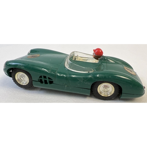 11 - A Boxed 1960's Tri-ang Scalextric green Aston Martin MM/C57 racing car with electric head and tail l... 