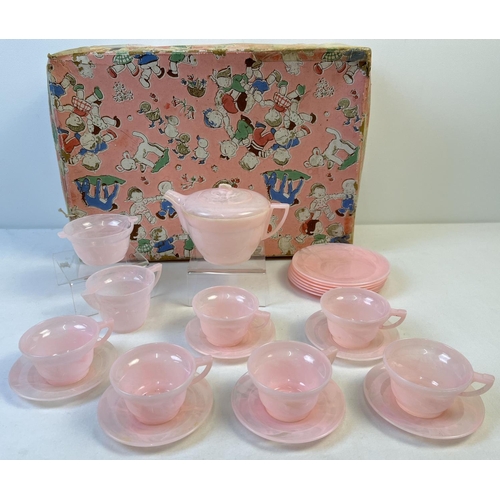 69 - A vintage pale pink marble effect early plastic 21 piece teaset by projects. Comprising: 6 cups and ... 