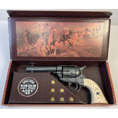 80 - A boxed Replica Single Action Army . 45 revolver toy gun with wood effect grip. Complete with imitat... 