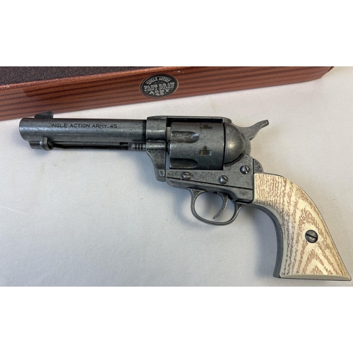 80 - A boxed Replica Single Action Army . 45 revolver toy gun with wood effect grip. Complete with imitat... 