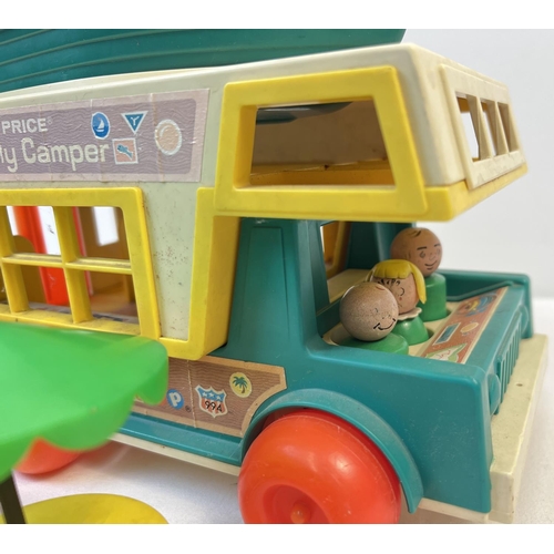 83 - A vintage Fisher Price Play Family Camper van with Boat and accessories. Age related sun fading to c... 