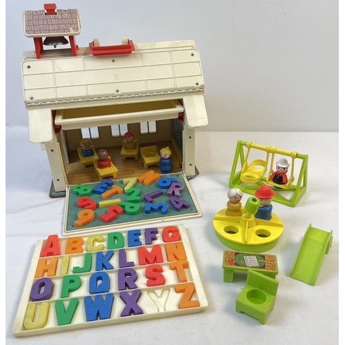 88 - A vintage Fisher Price School House with magnetic alphabet letters and numbers, figures and accessor... 