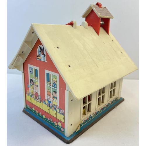 88 - A vintage Fisher Price School House with magnetic alphabet letters and numbers, figures and accessor... 