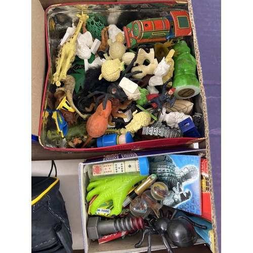 96 - A box of assorted vintage toys and games. To include Doctor Who, plastic farm animals, marbles, Star... 