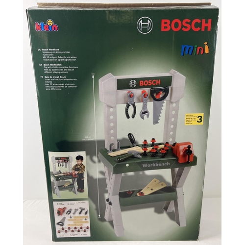 111 - A brand new and boxed Bosch Mini workbench with tools, by Klein. Box opened but all items inside are... 