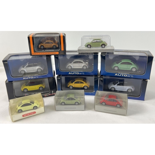 358 - 11 assorted boxed VW new shape Beetle diecast model cars, in varying sizes and colours. To include 5... 