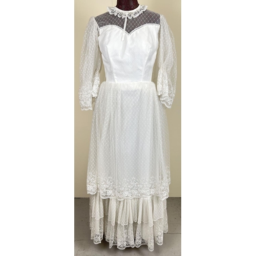 1372 - A vintage 1970's lace layered dress with angel sleeves and high neck.