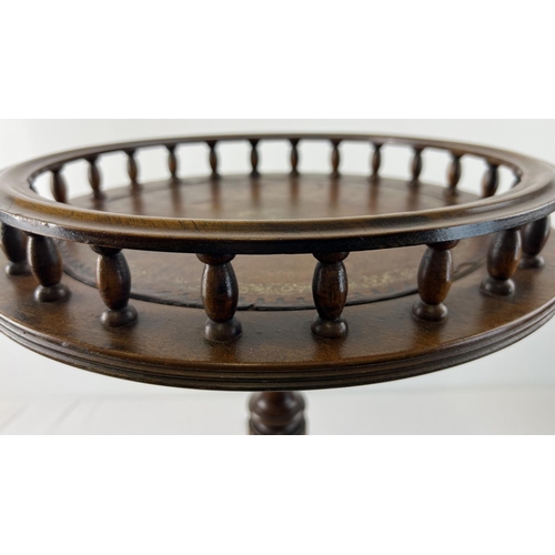 1426 - A vintage dark wood wine table with tripod feet, turned pedestal and galleried top. With brown leath... 