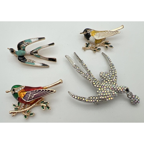 1009 - 4 costume jewellery stone set and enamelled bird shaped brooches. To include heavily stone set swall... 