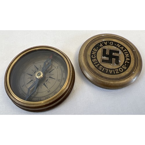 1170 - A reproduction brass cased German WWII style N.S.D.A.P compass with screw lid. Underside marked with... 