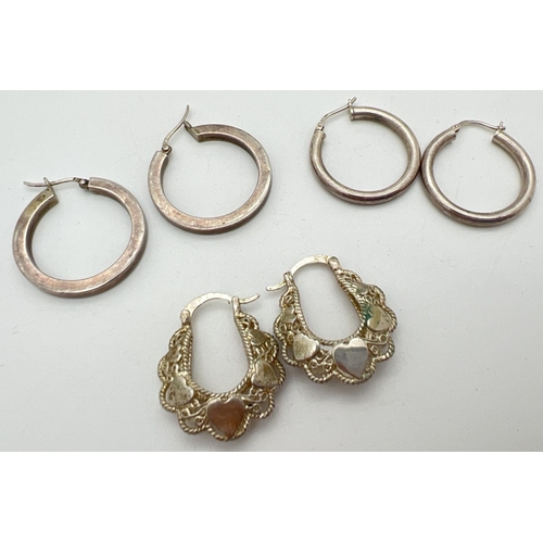 1019 - 3 pairs of silver hoop style earrings. 2 pairs of plain hoops together with a pair of pierced work h... 