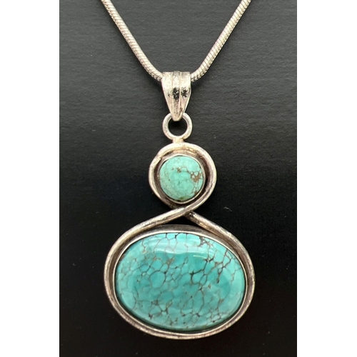 1023 - A modern design white metal twist shaped pendant, set with 2 turquoise stones on an 18