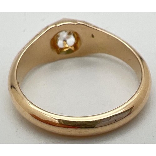 1003 - An Victorian style 15ct gold claw set single diamond dress ring. Floral detail to shoulders. Approx.... 