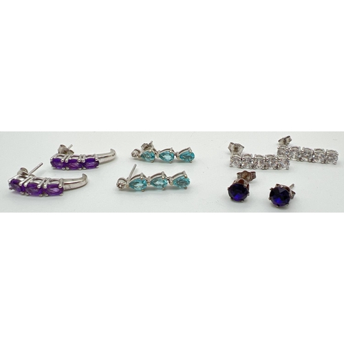 1044 - 4 pairs of stud and drop style stone set earrings. To include white topaz drops, amethyst drops by T... 